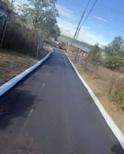 New asphalt driveway with concrete curb Jacksonville